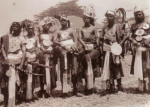 East-Timorese men in ceremonial attire