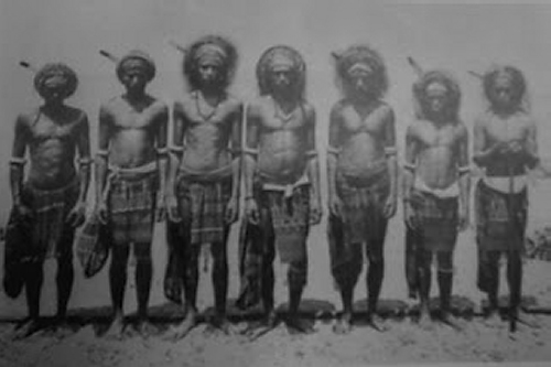 Men from the island of Babar in the South Moluccas in traditional ikat sarongs